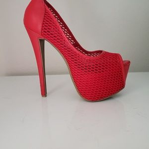 red mesh heels. size 10
